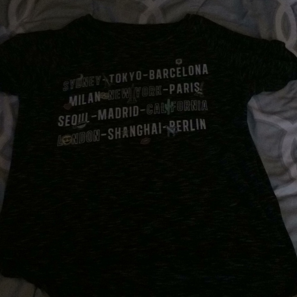 A shirt that has country’s on it